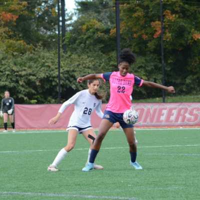 Staples freshman Remi Rutstein (No. 28) marks Notre Dame junior standout Kolbe McCray - Photo Andy Hutchison